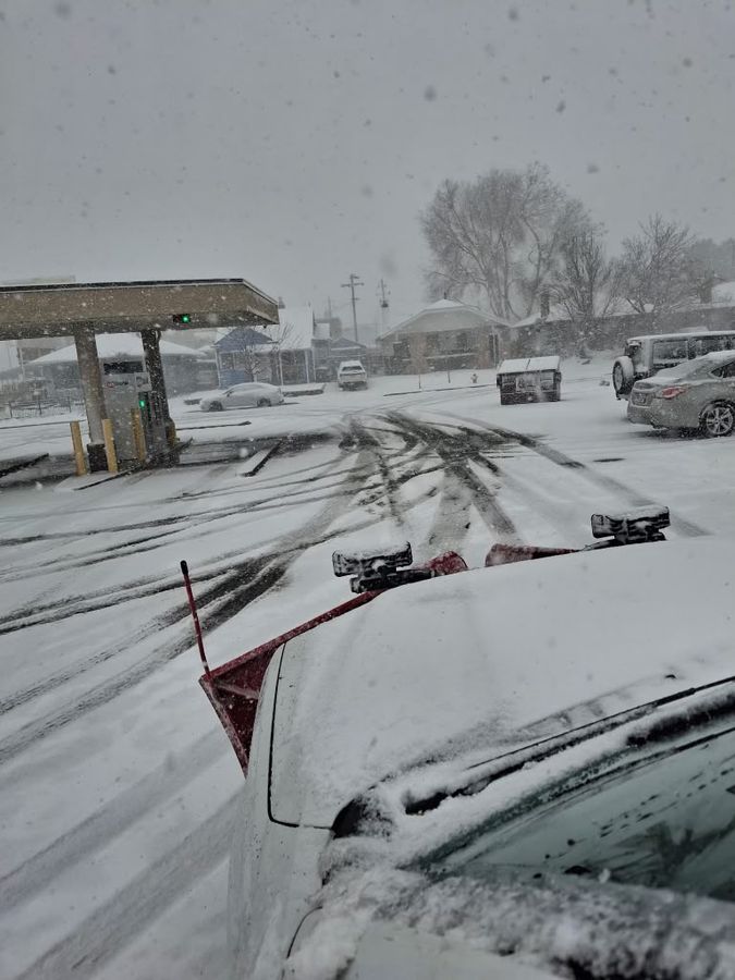 Plowing through heavy snowfall
