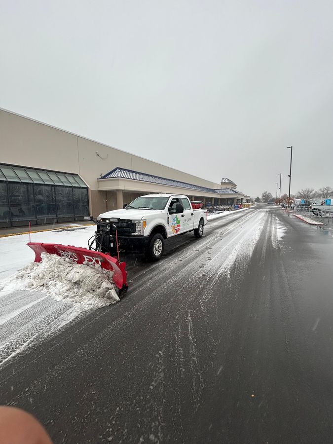 Plow truck staged on a storm route