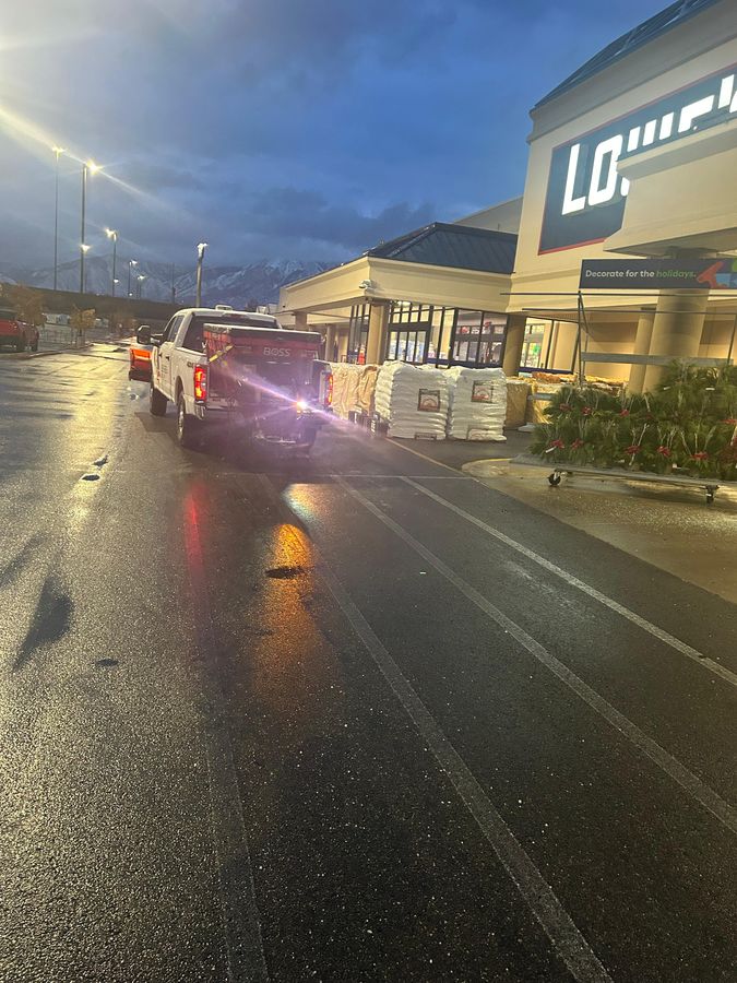 Loading salt before a storm at dusk